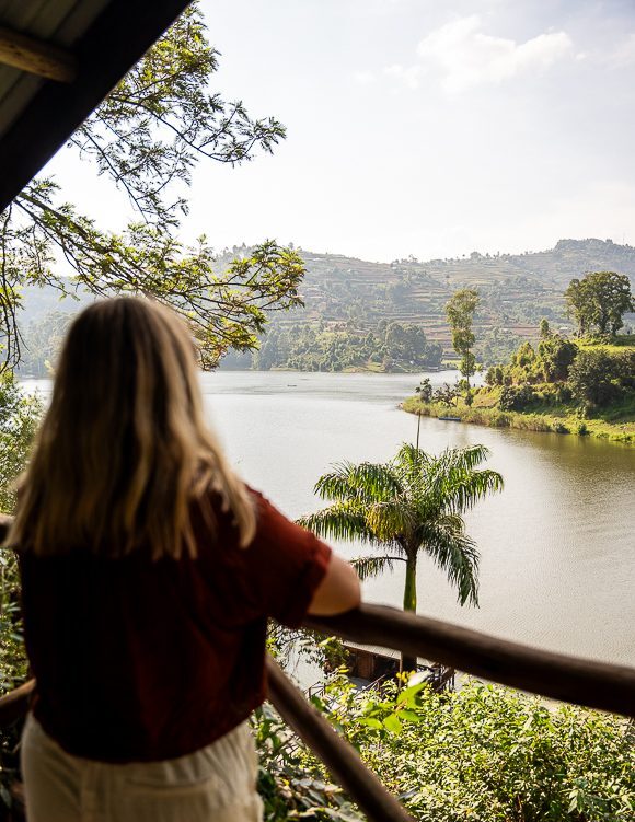 woman watching over lake bunyonyi